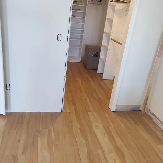 Finished wood-look flooring in a bedroom