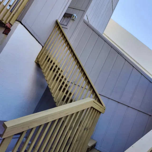 New wooden stair railing
