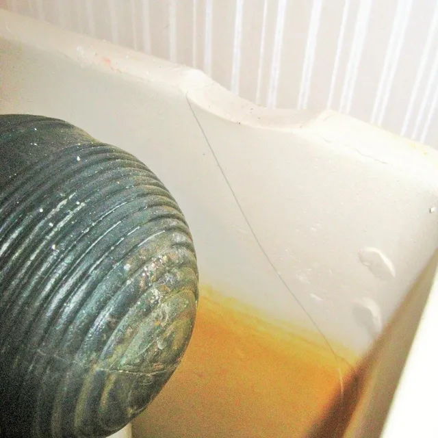 Cause of loss: a broken toilet tank